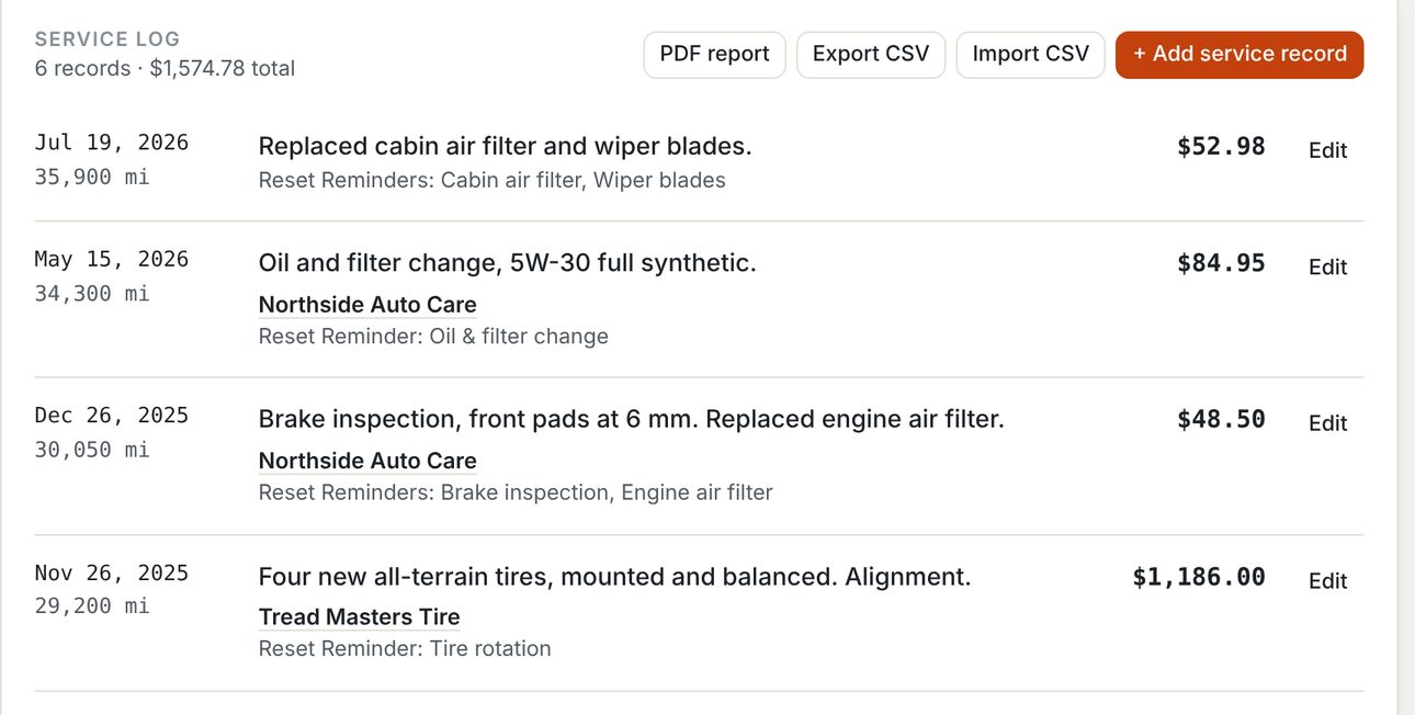 A service log listing dates, mileage, the work done, the shop and the cost, with the reminders each visit reset.